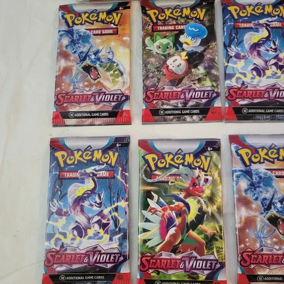 11 Packs Pokemon Scarlet and Violet Cards Factory Sealed Plus 2 Keychains - Picture 2 of 8